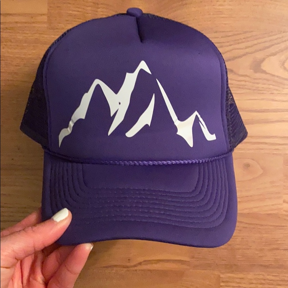 Purple trucker hat with mountain graphic